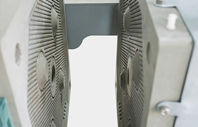 板框污泥壓濾機里的污泥為什么不能夠自動脫落