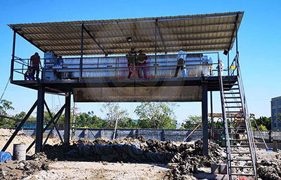 污泥脫水壓濾機怎么調(diào)試絮凝劑的配比量